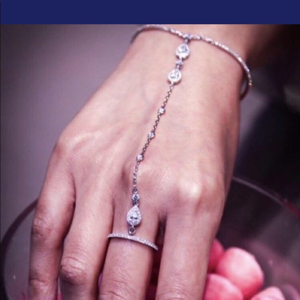 Silver slave bracelet, connected ring and bracelet